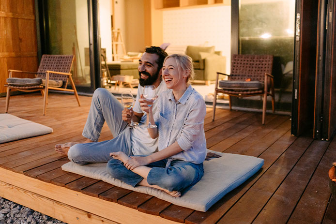 Man and woman enjoying their deck