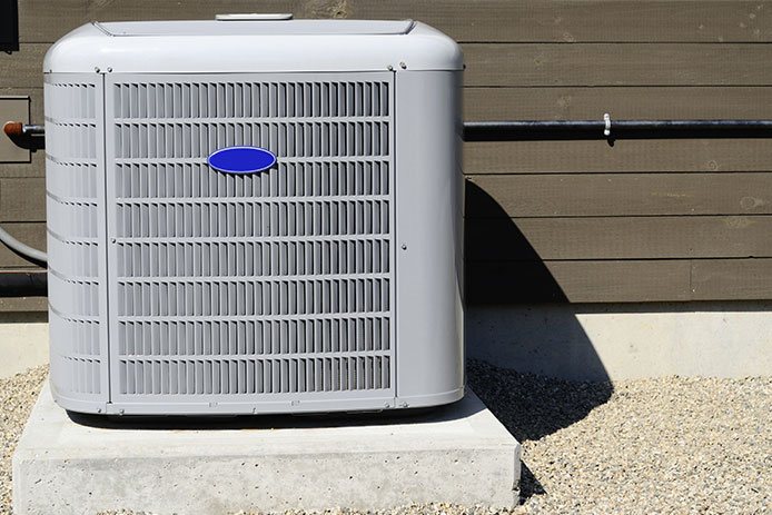 HVAC unit sitting on a concrete slab