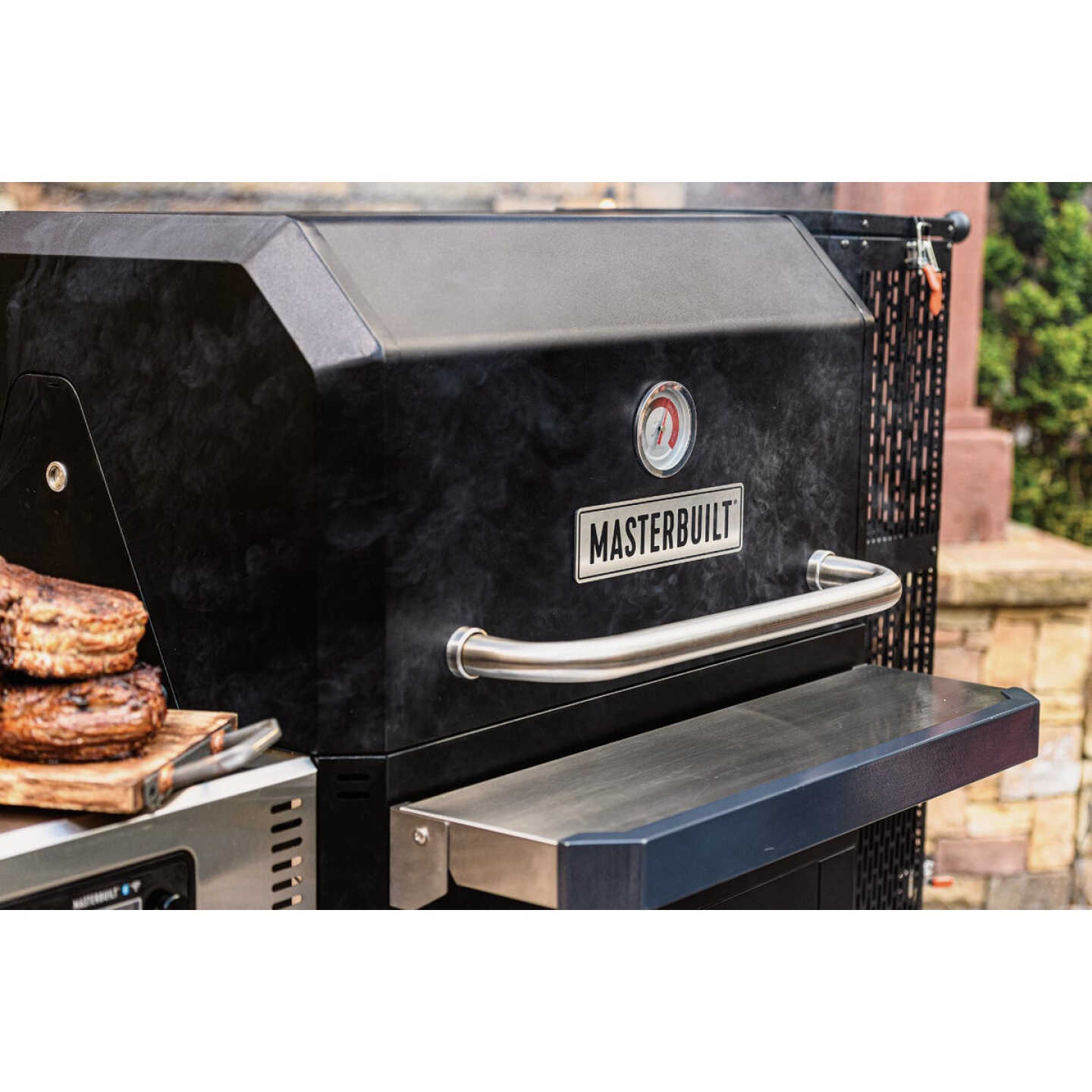 This gravity-fed charcoal grill cooks with tons of barbecue flavor